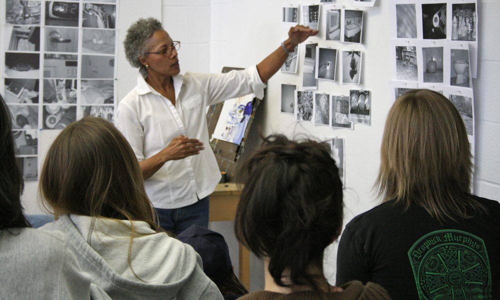 Deborah Dancy critiques students work at the Fine Arts Building. Deborah Dancy critiques students work at the Fine Arts Building.